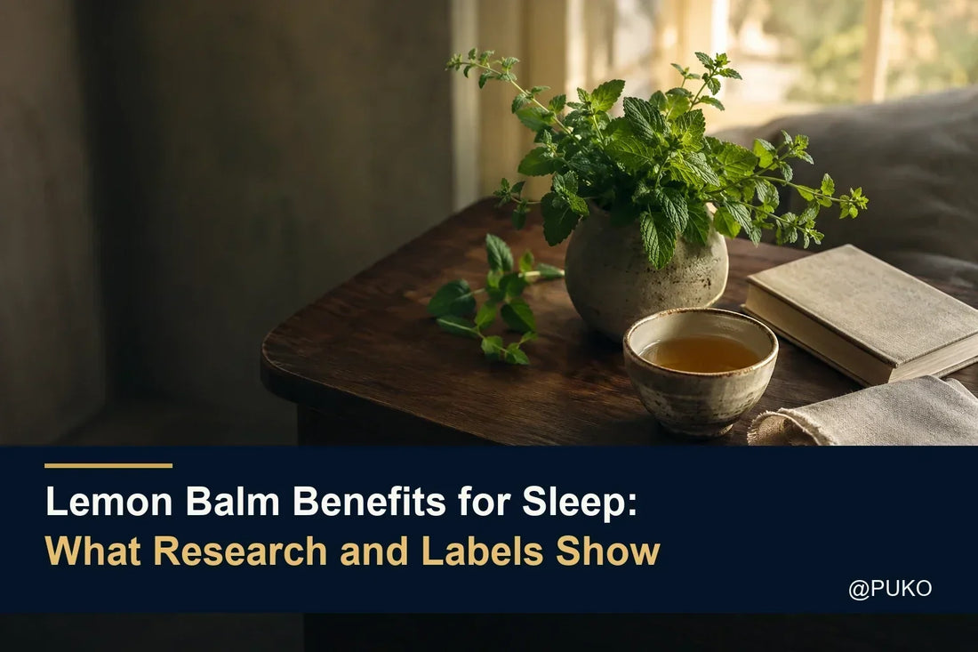 Fresh lemon balm and herbal tea in a warm evening scene beneath the title Lemon Balm Benefits for Sleep: What Research and Labels Show and a small @PUKO watermark