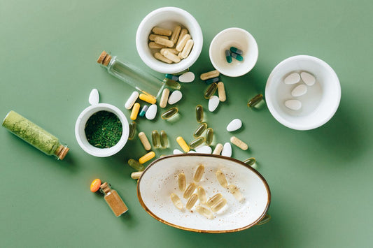Daily wellness supplement capsules flat lay: sleep support and focus support